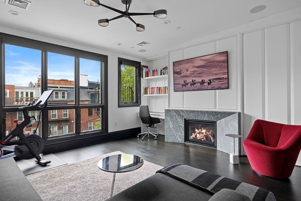 Fireplace, Fitness Equipment, Interior, Recessed Lighting, Wood Texture Flooring