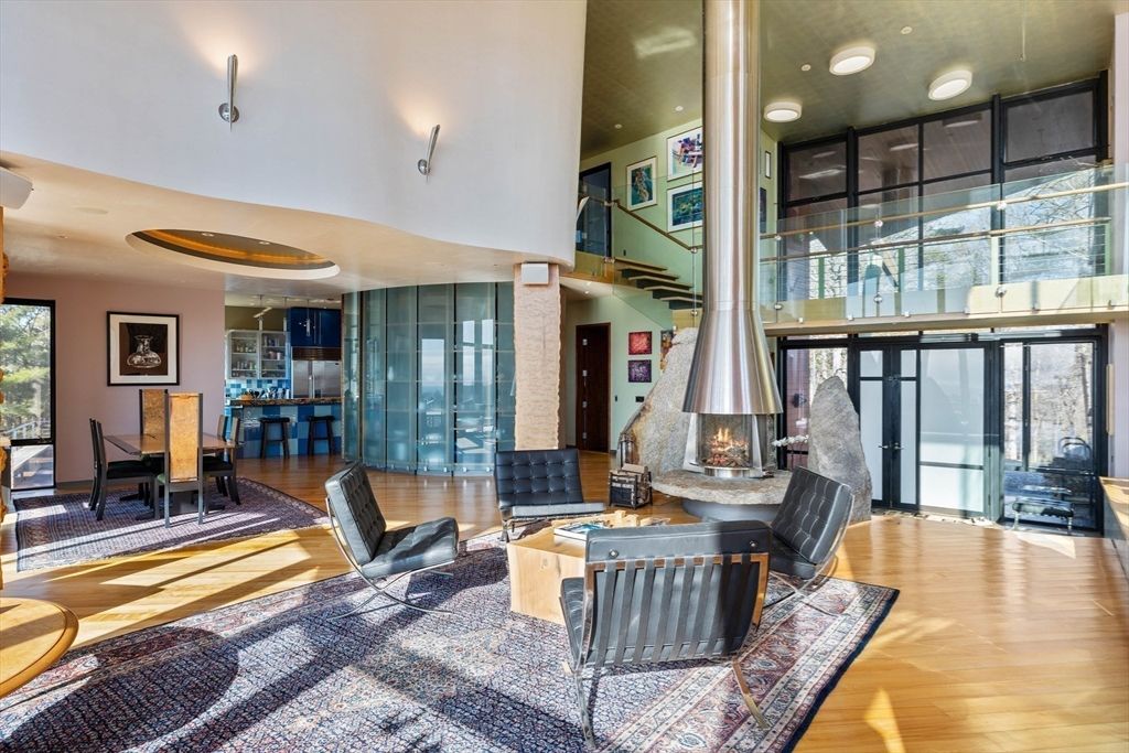 Dining room, Fireplace, Interior, Living room, Recessed Lighting, Wood Texture Flooring