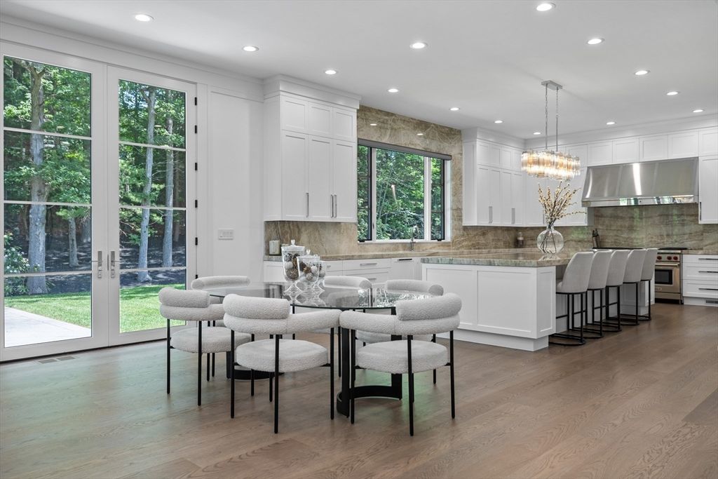 Chandelier, Dining room, Interior, Kitchen, Pendant Lights, Recessed Lighting, Stainless Steel Appliances, Wood Texture Flooring