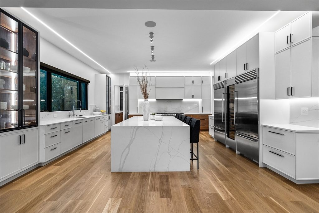 Interior, Kitchen, Marble Walls, Stainless Steel Appliances, Wood Texture Flooring