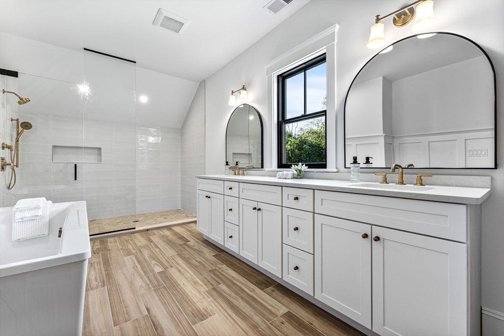 Bathroom, Dual Sink Vanities, Glass Shower, Interior, Recessed Lighting, Wood Texture Flooring