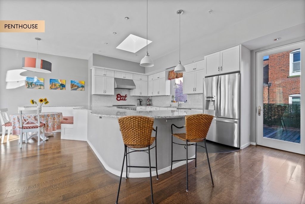 Dining room, Interior, Kitchen, Pendant Lights, Recessed Lighting, Stainless Steel Appliances, Wood Texture Flooring