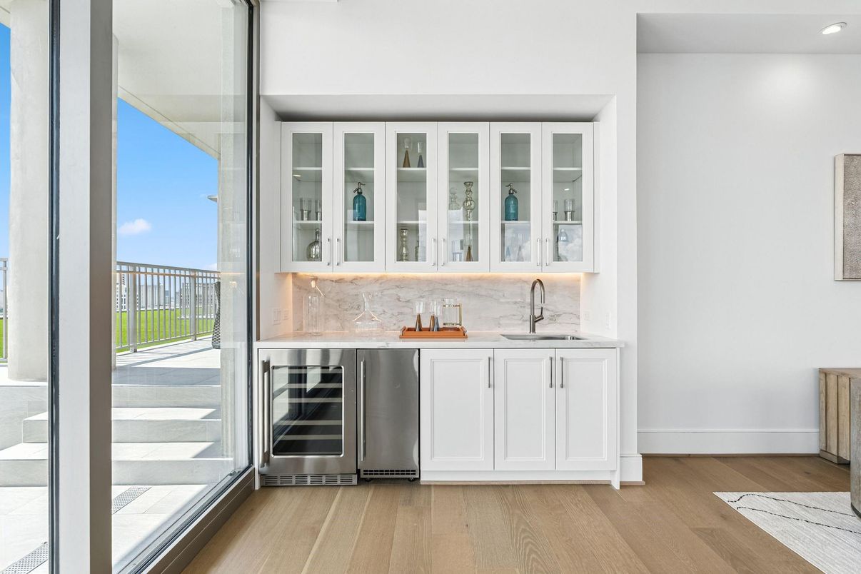 Interior, Kitchen, Marble Walls, Recessed Lighting, Stainless Steel Appliances, Wood Texture Flooring