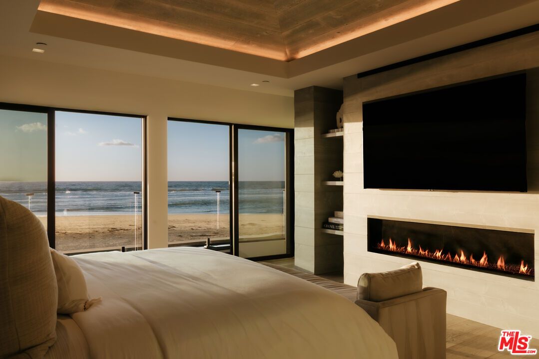 Bedroom, Fireplace, Interior, Recessed Lighting, Water, Wood Texture Flooring