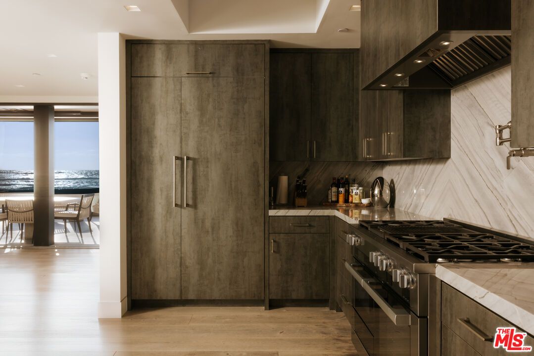 Dining room, Interior, Kitchen, Recessed Lighting, Stainless Steel Appliances, Water, Wood Texture Flooring