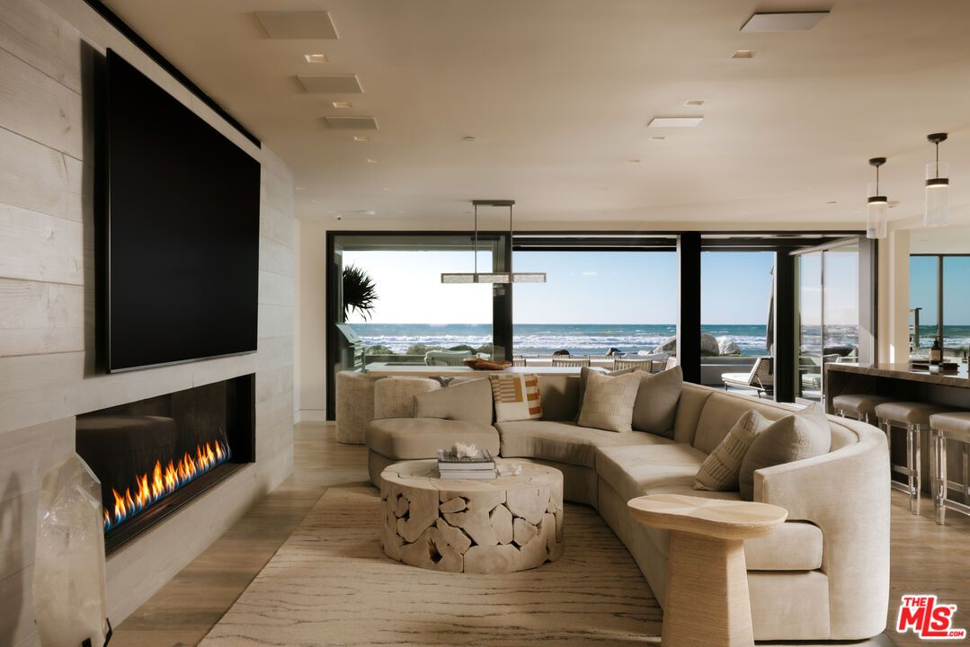 Fireplace, Interior, Living room, Pendant Lights, Recessed Lighting, Water, Wood Texture Flooring